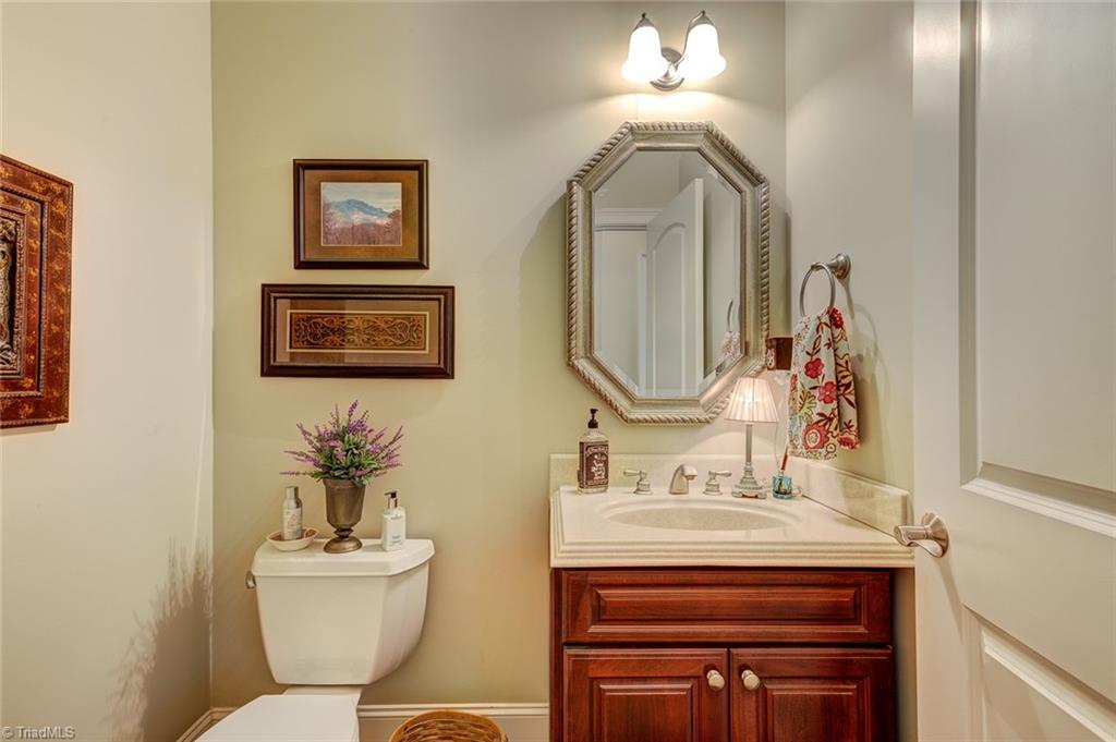 122 Augusta Place High Point, NC 27265 - Photo 12 of 30 The main level offers a guest half bath with a beautiful vanity.