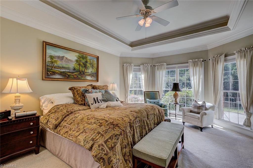 122 Augusta Place High Point, NC 27265 - Photo 13 of 30 The spacious main level master receives superior natural light and features a lovely ceiling detail as well as a beautiful sitting area.