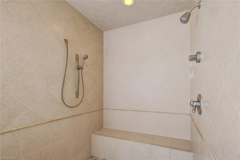 122 Augusta Place High Point, NC 27265 - Photo 18 of 30 The master bath also features an oversized separate shower with bench seat and additional sliding bar shower head.