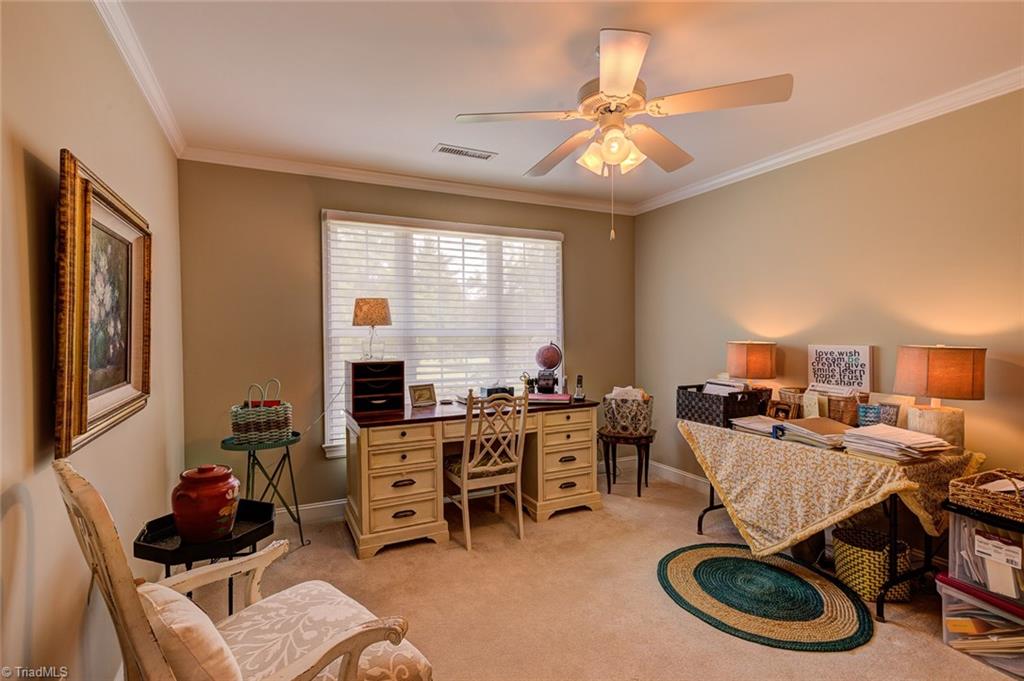 122 Augusta Place High Point, NC 27265 - Photo 20 of 30 The second bedroom is spacious and bright with crown molding detail.