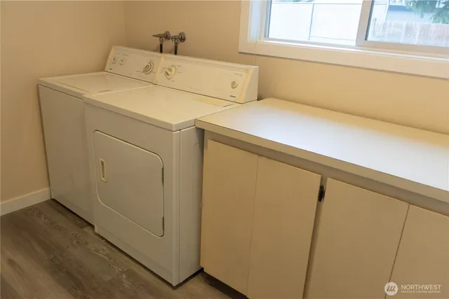 a utility room with dryer and washer