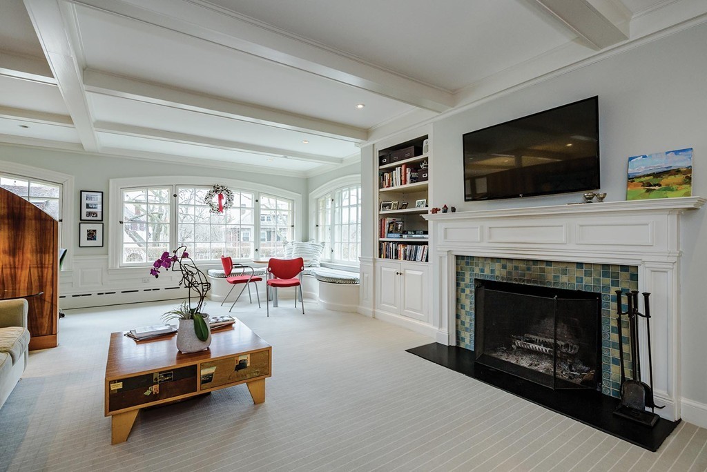 207 Dean Road Brookline, MA 02445 - Photo 9 of 20 a living room with furniture and a fireplace