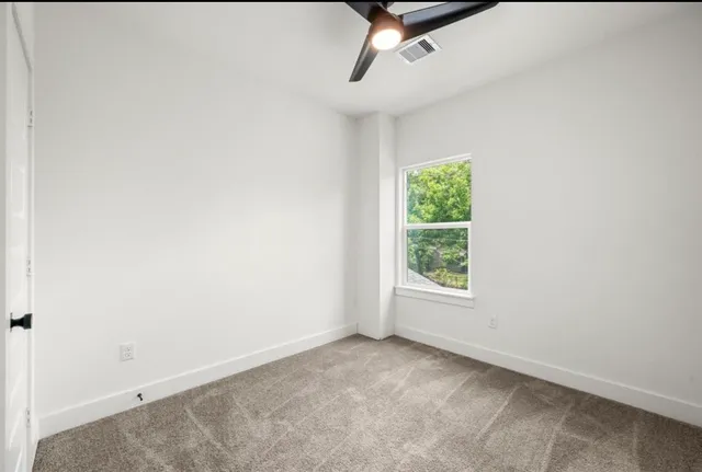 an empty room with window