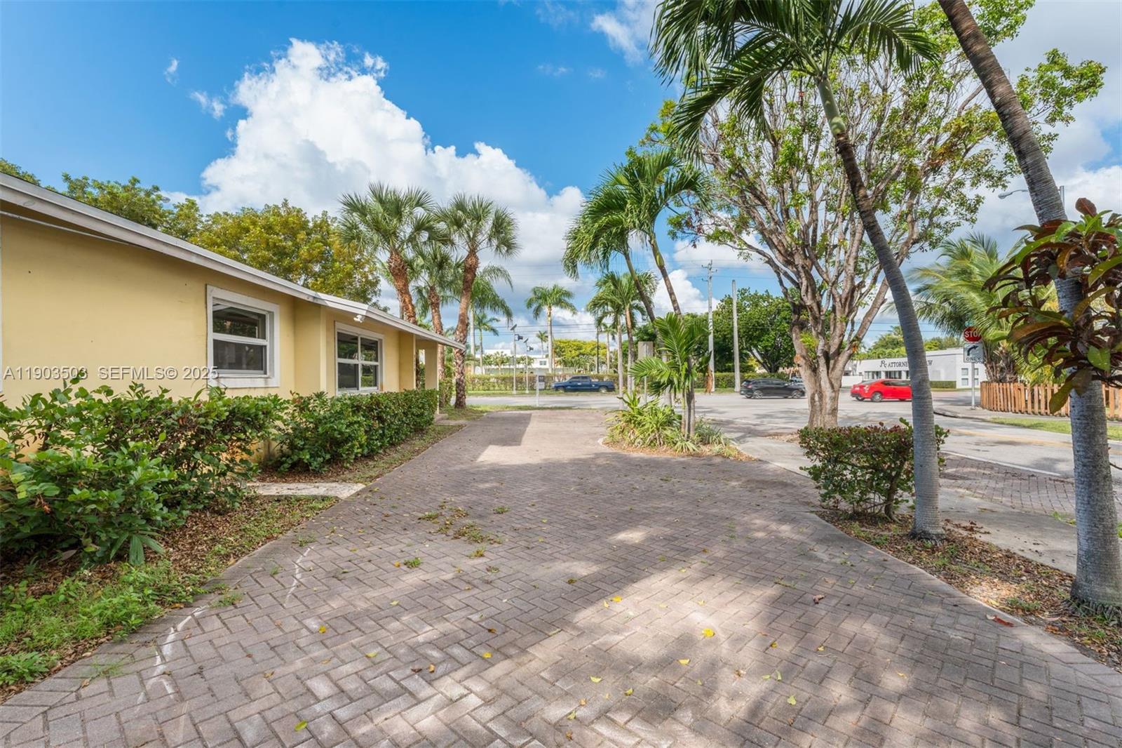 8670 Southwest 27th Lane Miami, FL 33155 - Photo 4 of 31 a view of road and trees