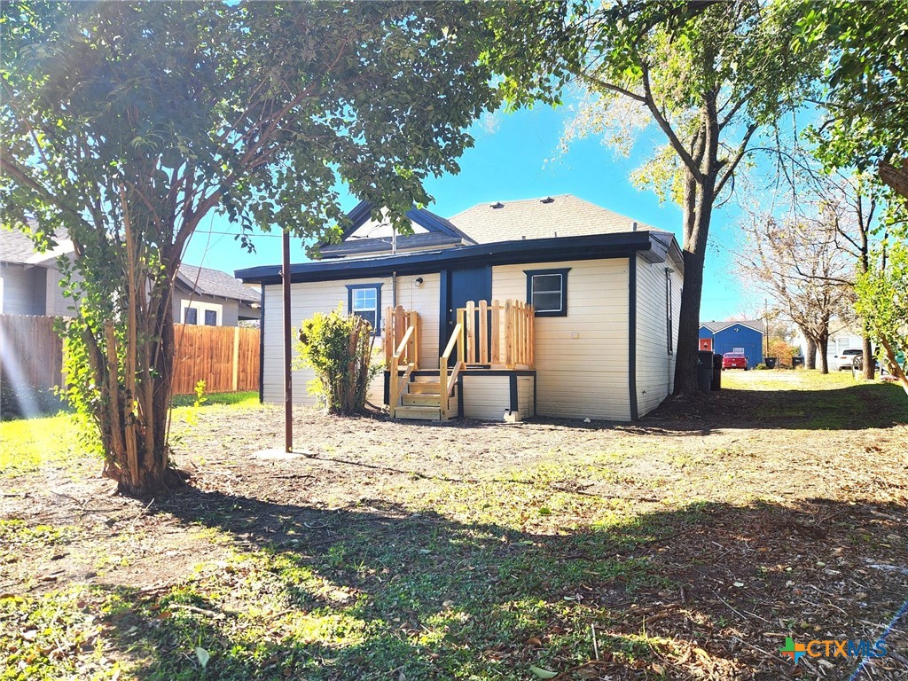 209 South 27th Street Temple, TX 76504 - Photo 24 of 26 a view of a house with snow on the tree