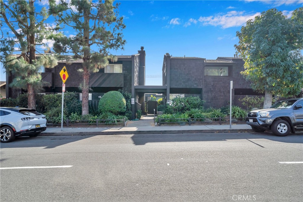 a view of a cars parked in front of a building