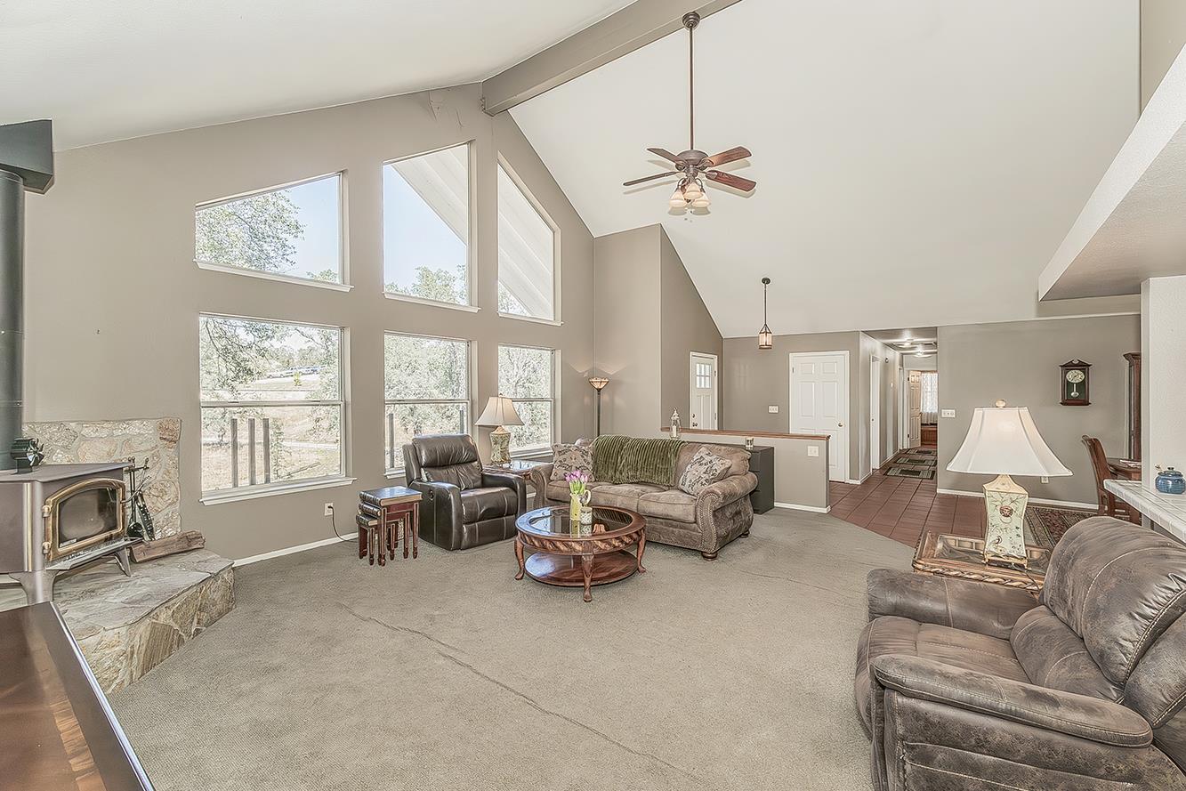 14815 Garlock Lane Prather, CA 93651 - Photo 10 of 80 a living room with furniture and large windows