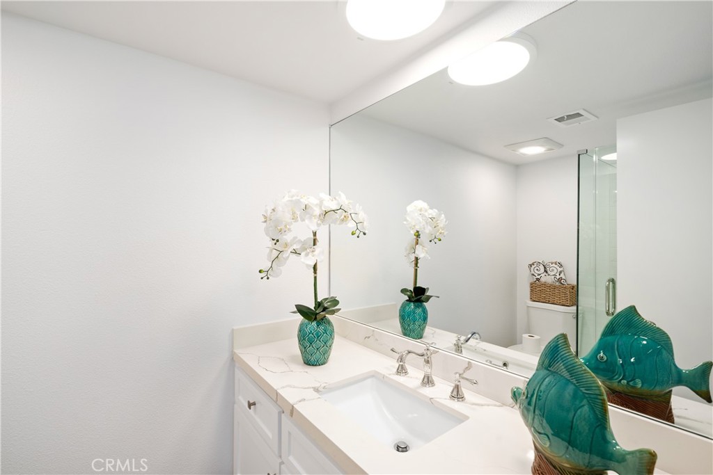 435 Fairview Avenue, Unit 7 Arcadia, CA 91007 - Photo 15 of 35 a bathroom with a sink and a mirror