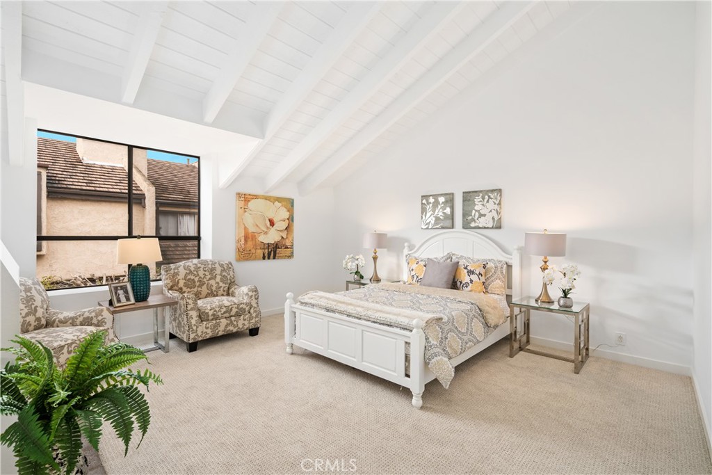 435 Fairview Avenue, Unit 7 Arcadia, CA 91007 - Photo 22 of 35 a spacious bedroom with a bed and a couch