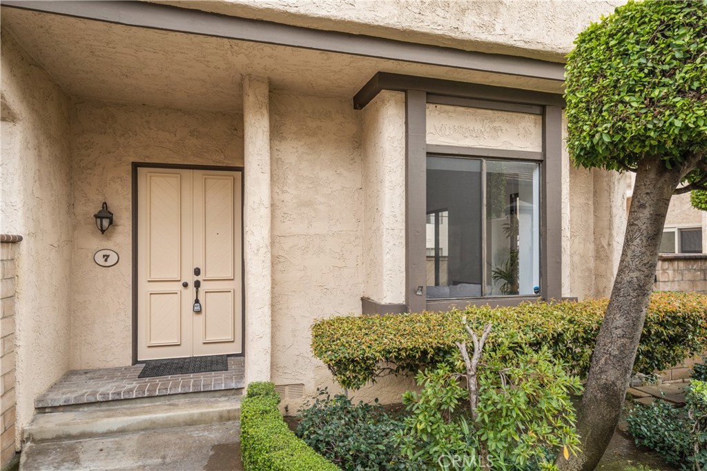 435 Fairview Avenue, Unit 7 Arcadia, CA 91007 - Photo 35 of 35 a front view of a house with a yard