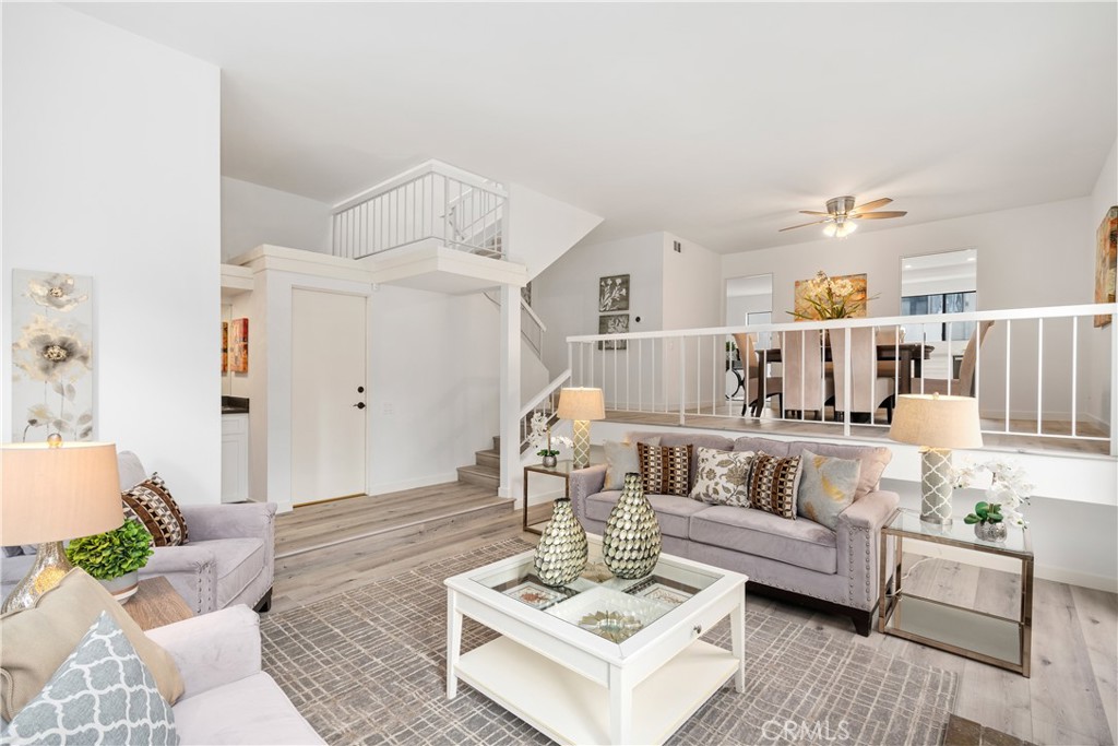 435 Fairview Avenue, Unit 7 Arcadia, CA 91007 - Photo 7 of 35 a living room with furniture and wooden floor