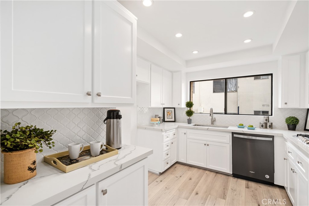 435 Fairview Avenue, Unit 7 Arcadia, CA 91007 - Photo 10 of 35 a kitchen with a sink and cabinets