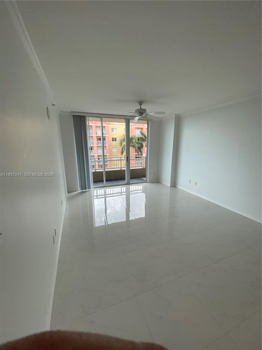 2665 Southwest 37th Avenue, Unit 508 Miami, FL 33133 - Photo 9 of 12 an empty room with windows