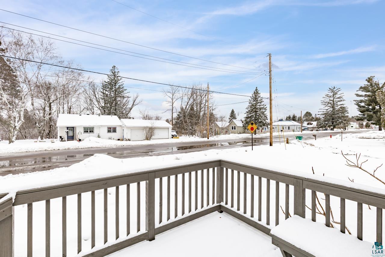 3754 Carlton Street Barnum, MN 55707 - Photo 28 of 52 Snow covered deck with a residential view