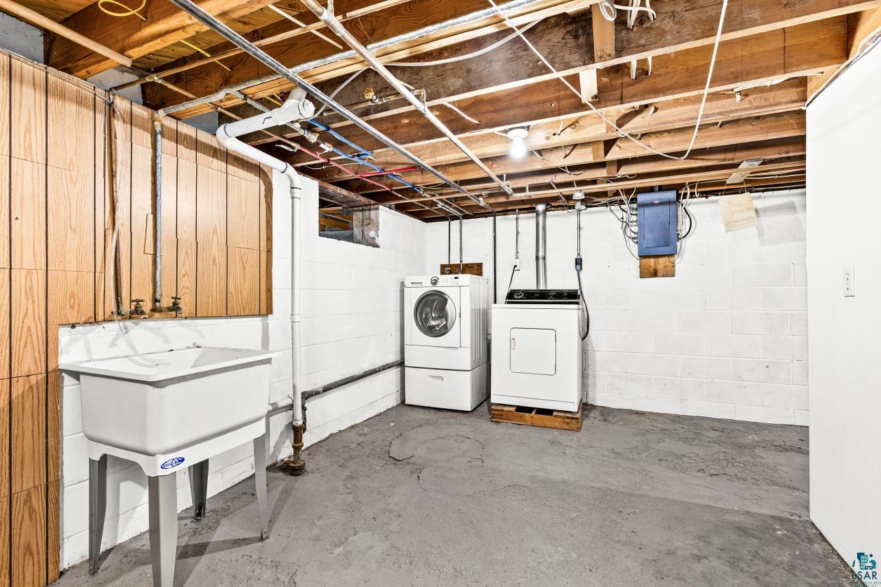 3754 Carlton Street Barnum, MN 55707 - Photo 49 of 52 Unfinished basement with washer and dryer and electric panel