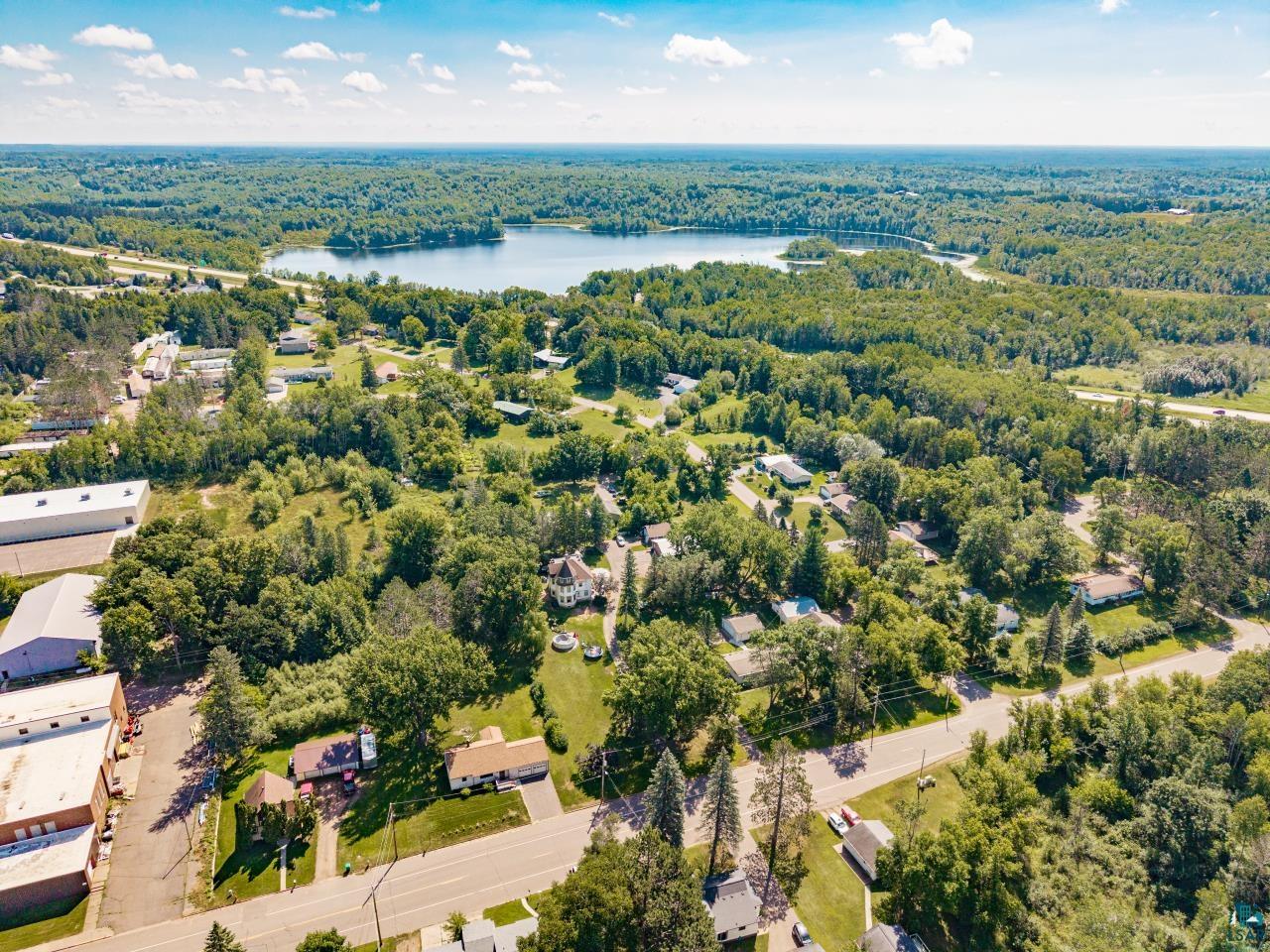 3754 Carlton Street Barnum, MN 55707 - Photo 5 of 52 Drone / aerial view of a forest and a nearby body of water