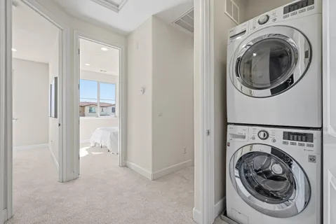 a view of washer and dryer in a utility room