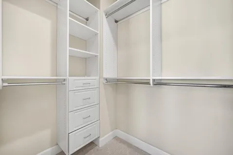 a view of an empty walk in closet
