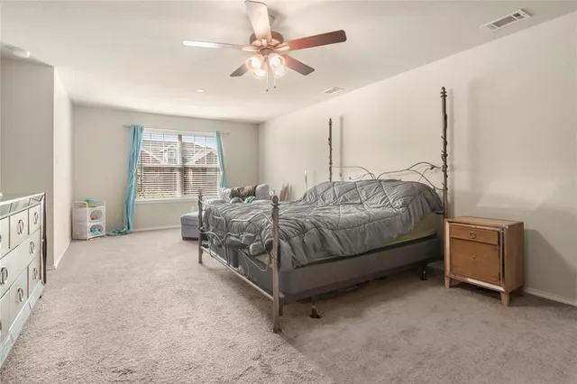 a stove top oven sitting inside of a kitchen