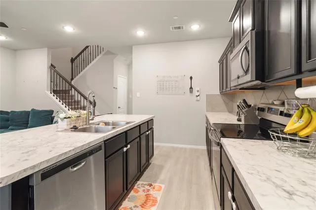 a view of swimming pool with outdoor seating yard and mountain view in back