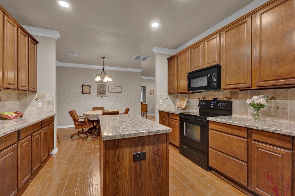 7128 Mosley Street Amarillo, TX 79119 - Photo 11 of 25 Kitchen 2