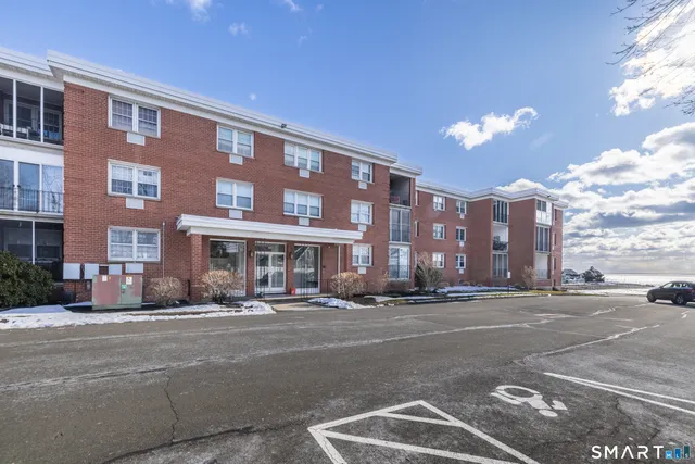 a city street lined with tall buildings