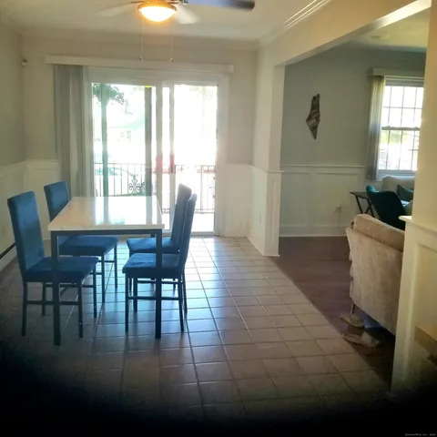 a kitchen with stainless steel appliances a refrigerator sink and cabinets
