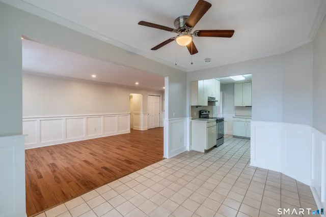 a kitchen with stainless steel appliances a refrigerator and a sink