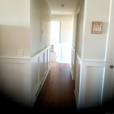 a bedroom with bed and window