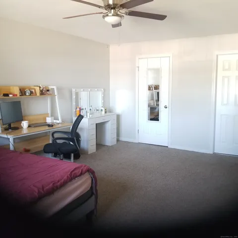 a bathroom with a bathtub and shower