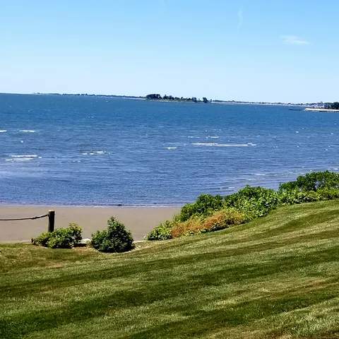 a view of swimming pool with a lake view
