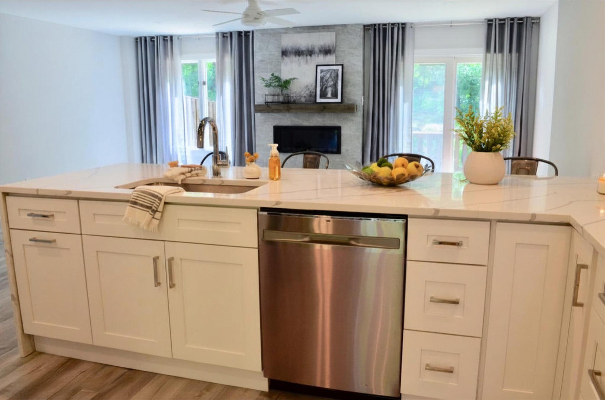 316 Fox Run Exton, PA 19341 - Photo 4 of 21 a room with kitchen island a counter space a stove and a wooden floor