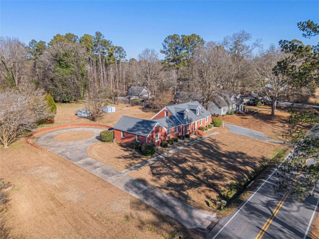 614 Burnett Ferry Road Southwest Rome, GA 30165 - Photo 21 of 29 a view of a swimming pool with a yard