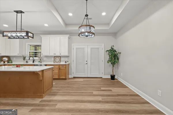 a view of a kitchen with granite countertop lots of counter top space