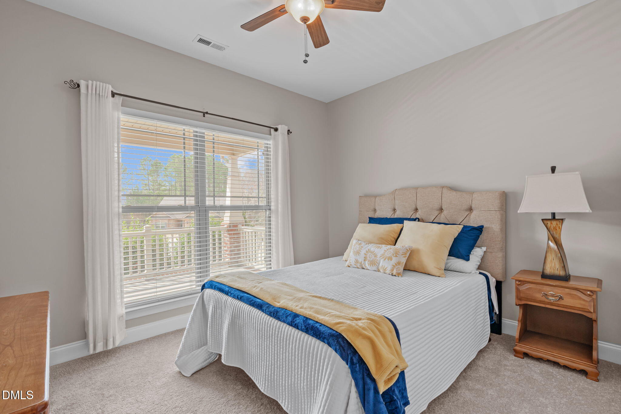 90 Cypress Ridge Way. Willow Spring, NC 27592 - Photo 19 of 52 Bright window, overlooking front porch, ceiling fan and closet.