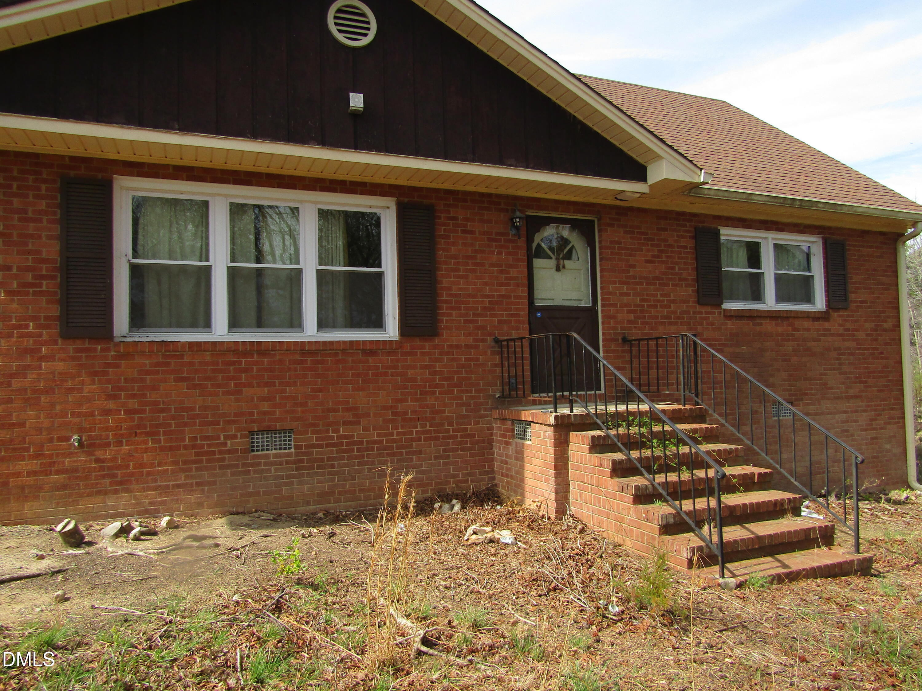 5950 Union Ridge Road Burlington, NC 27217 - Photo 4 of 24 a front view of a house with a yard