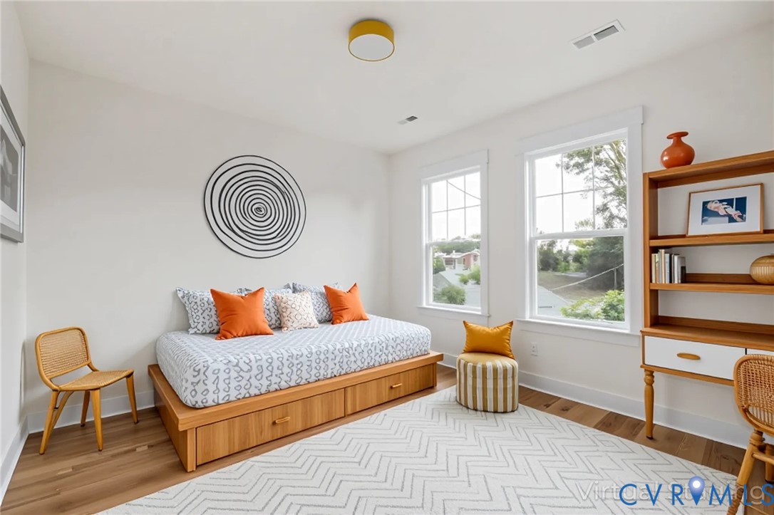 3423 Stuart Avenue Richmond, VA 23221 - Photo 26 of 34 a bedroom with furniture and a window