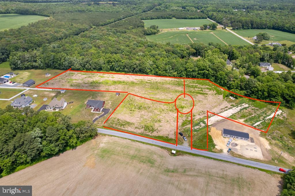 2 Brittingham Road Delmar, DE 19940 - Photo 4 of 8 a view of swimming pool with a yard