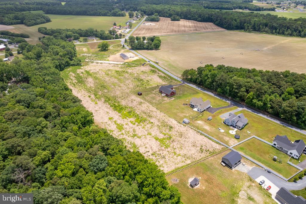 2 Brittingham Road Delmar, DE 19940 - Photo 5 of 8 an aerial view of a house with a yard