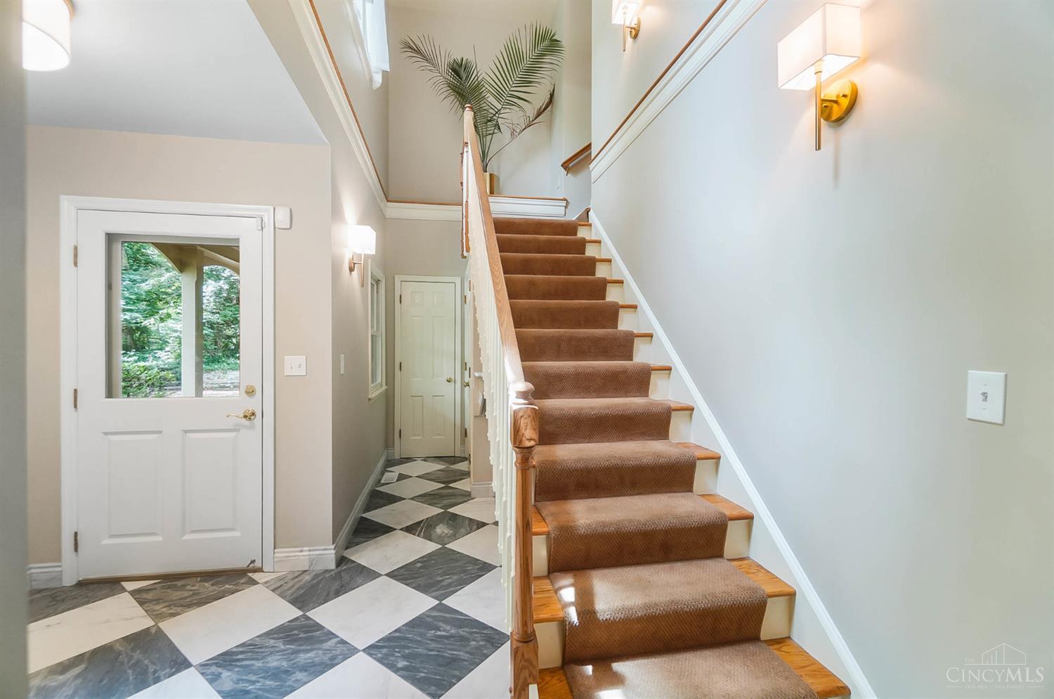 8000 Graves Road Cincinnati, OH 45243 - Photo 34 of 85 Newly painted Mudroom with new marble floors and stairs leading to Private Suite
