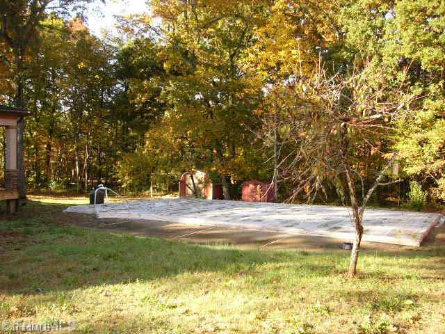 9451 Gideon Grove Road Stokesdale, NC 27357 - Photo 5 of 12 Swimming Pool/Hot Tub/Sauna.