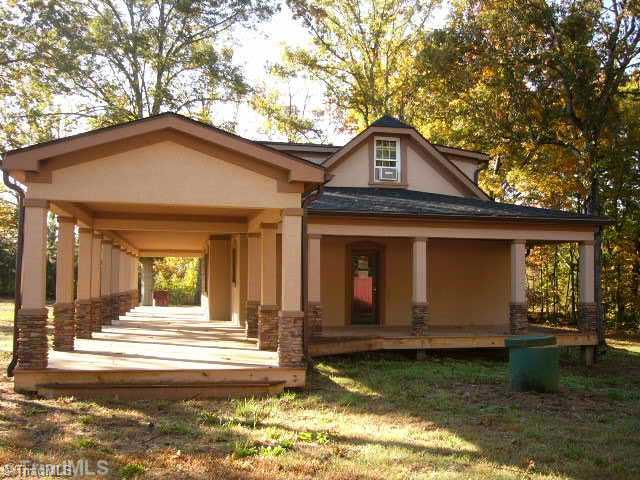 9451 Gideon Grove Road Stokesdale, NC 27357 - Photo 6 of 12 Exterior Front. Right side