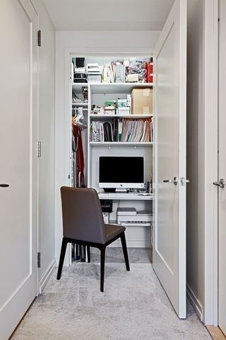 a view of a livingroom with furniture and a flat screen tv