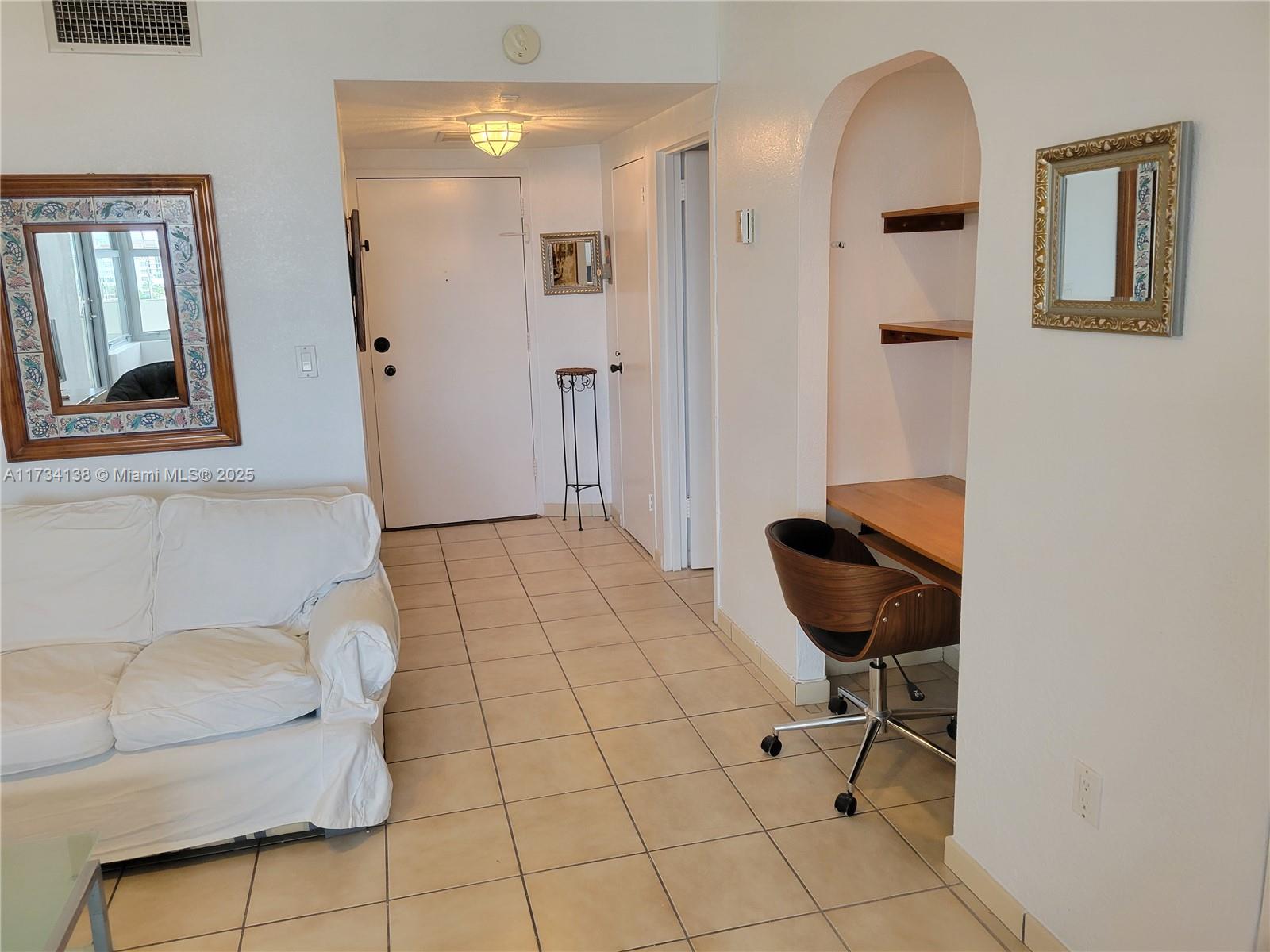 2899 Collins Avenue, Unit 1114 Miami Beach, FL 33140 - Photo 11 of 22 a bathroom with a toilet