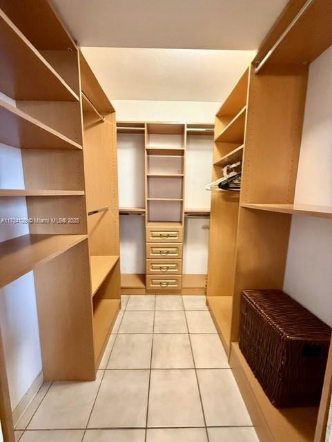 2899 Collins Avenue, Unit 1114 Miami Beach, FL 33140 - Photo 14 of 22 a view of walk in closet with empty racks