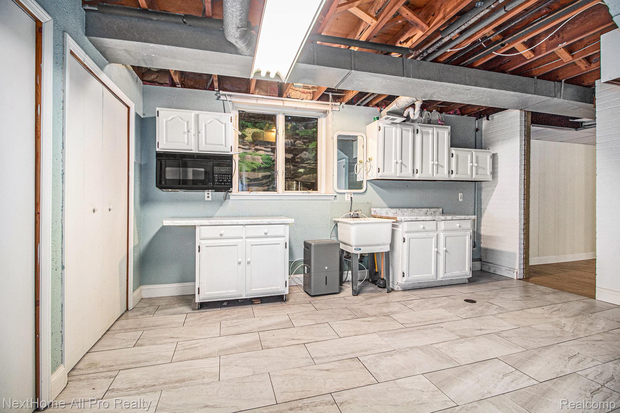 7195 Curtis Road Northville, MI 48168 - Photo 45 of 70 Laundry room and/or 2nd kitchen.