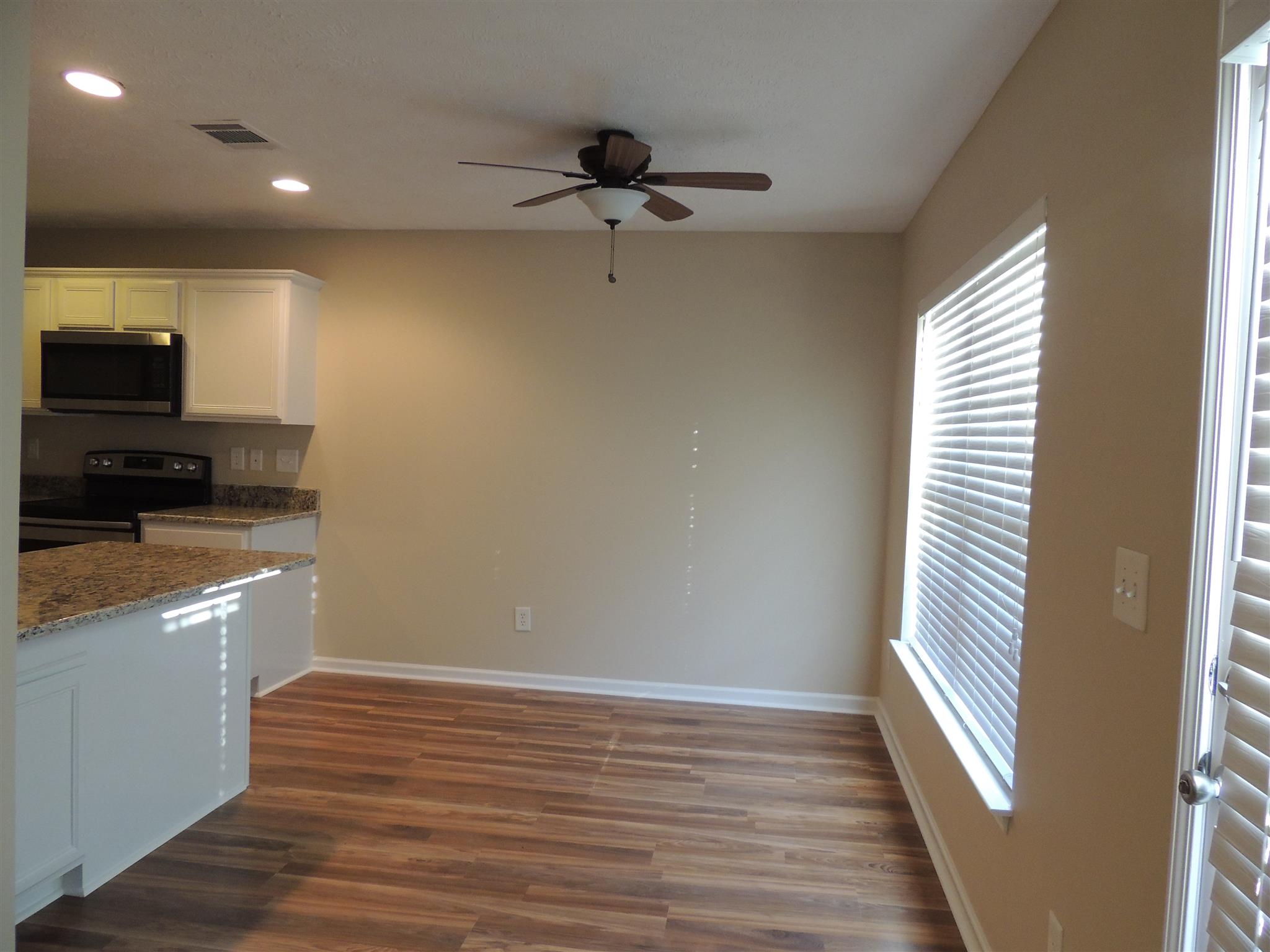 3504 Flora Drive Spring Hill, TN 37174 - Photo 11 of 17 a view of a kitchen from the hallway