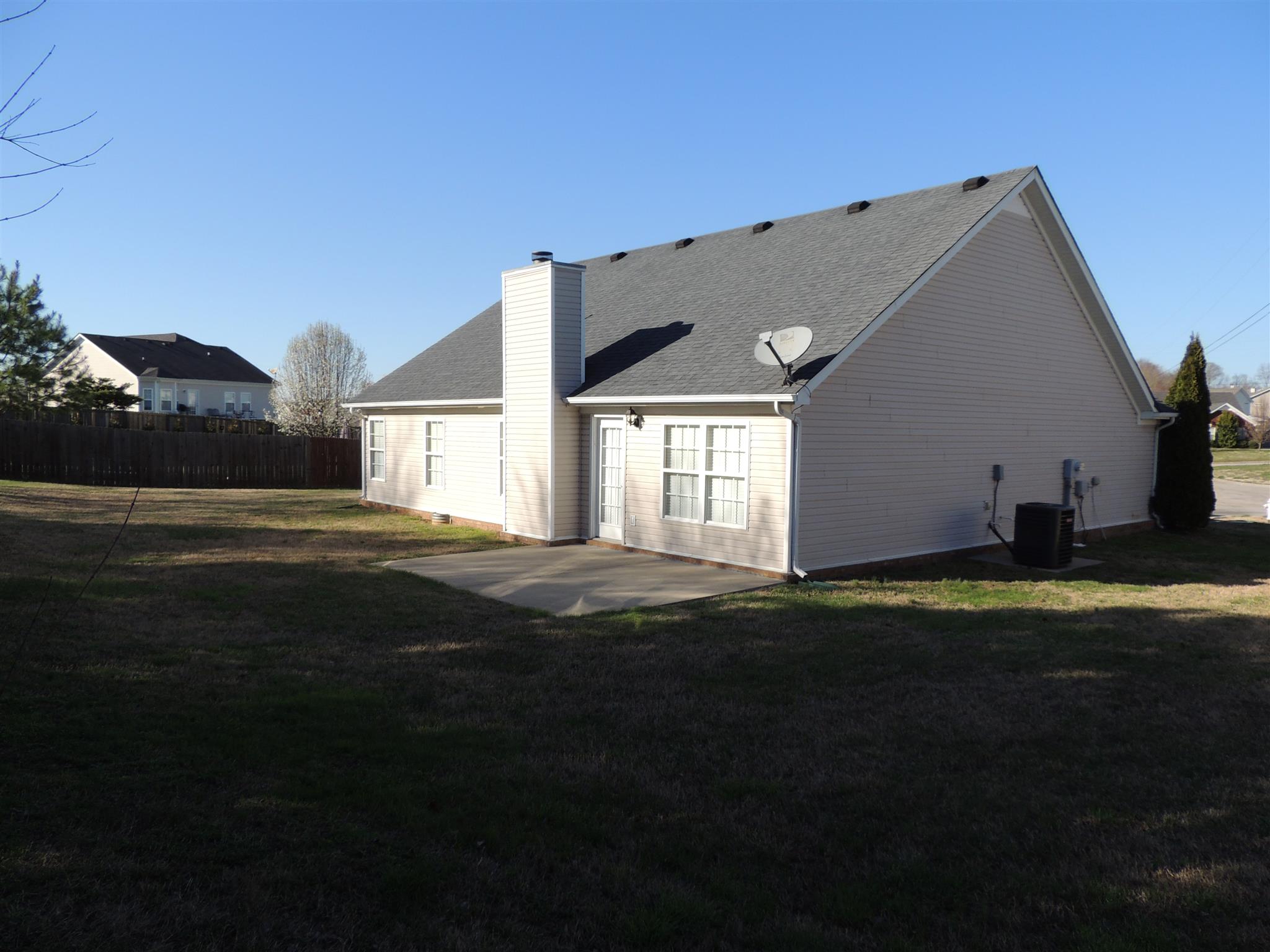 3504 Flora Drive Spring Hill, TN 37174 - Photo 15 of 17 a view of a house with a yard
