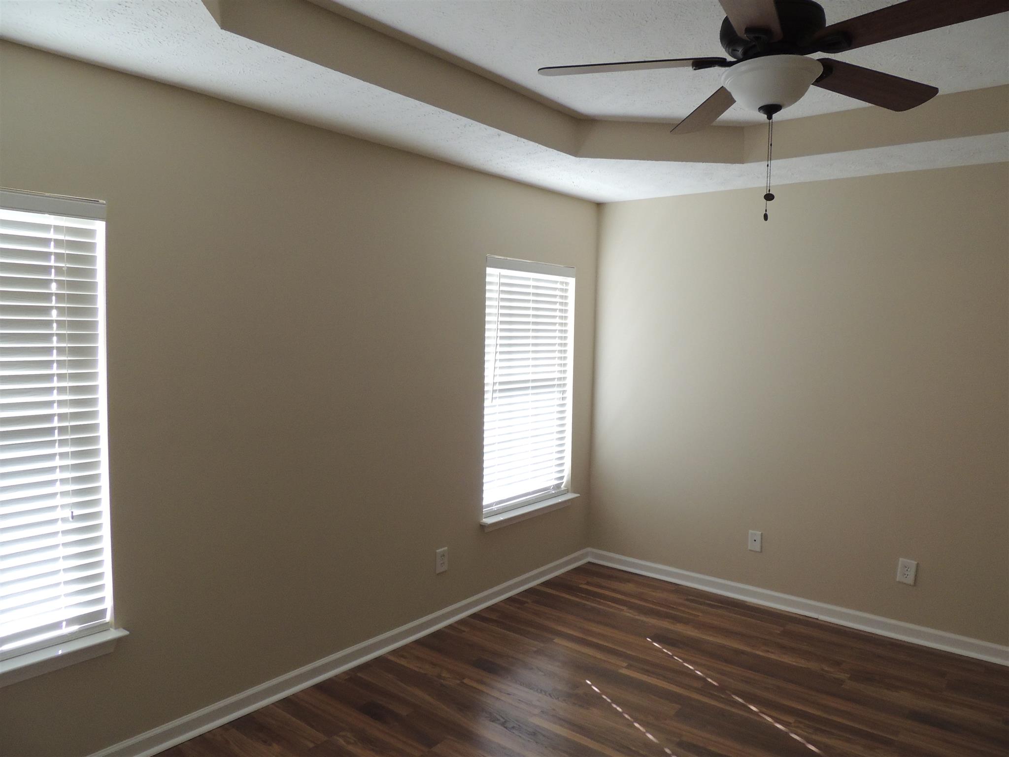 3504 Flora Drive Spring Hill, TN 37174 - Photo 2 of 17 a view of an empty room with a window and wooden floor