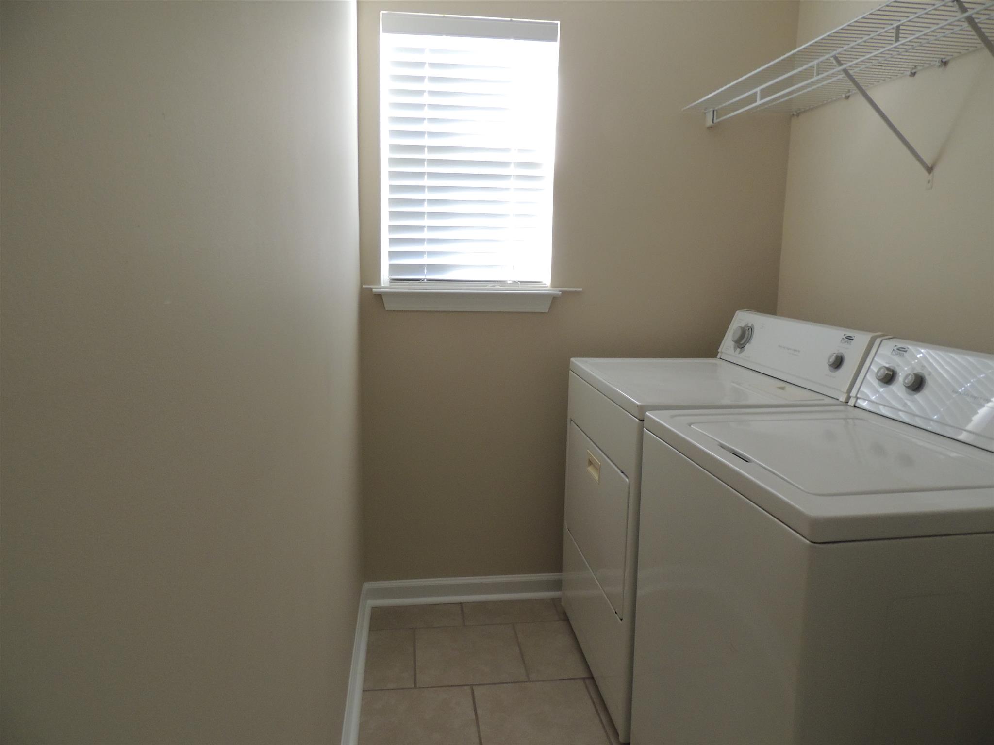 3504 Flora Drive Spring Hill, TN 37174 - Photo 5 of 17 a utility room with dryer and washer